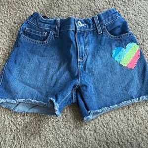 Adorable girls jean shorts, size 10 w, adjustable waist and heart detail